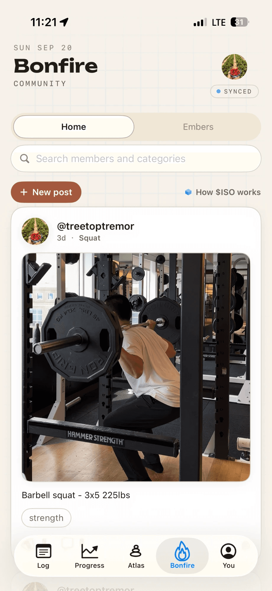 Isofit's Bonfire tab showing the Home and Embers feed toggle, a search bar for members and categories, a New post button, and a post by @treetoptremor with a barbell squat photo captioned Barbell squat 3x5 225lbs, tagged strength.